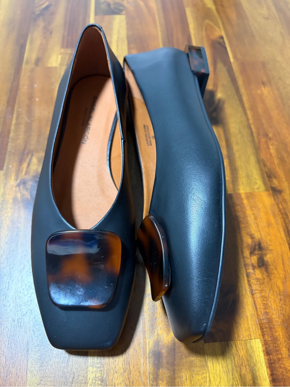 Angel Alarcon Black genuine Leather Square-Toe Flats with Tortoiseshell Accent .